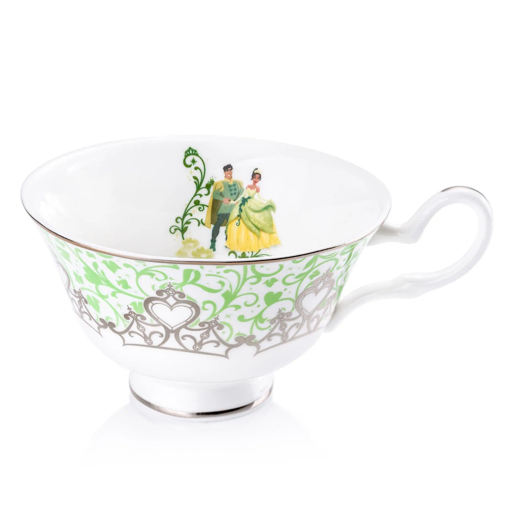 White fine bone china tea cup with green floral border and curved side handle