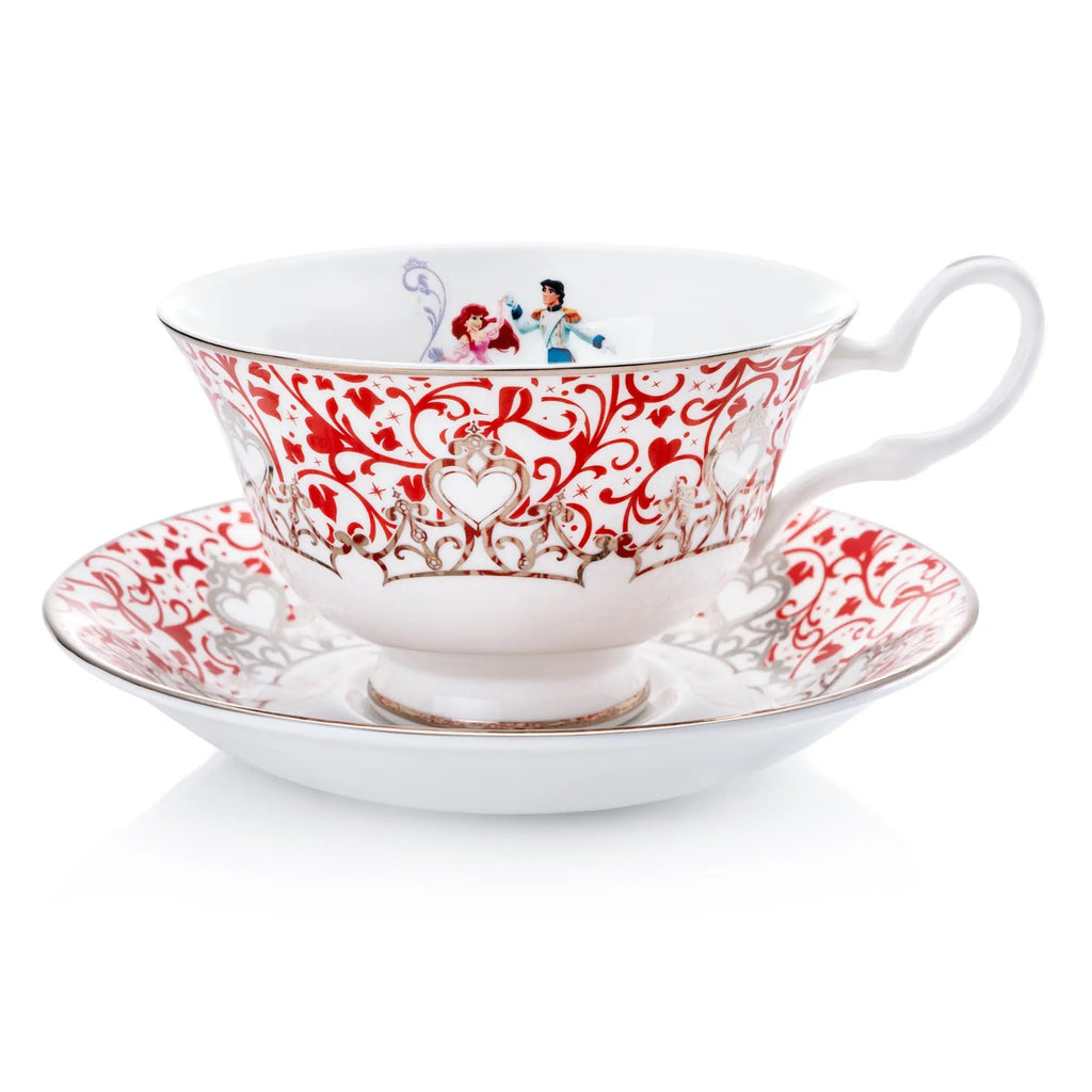 White fine bone china cup and saucer with red ornate scroll pattern and heart medallion