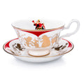 Fine bone china teacup with matching saucer, white with red Queen of Hearts design