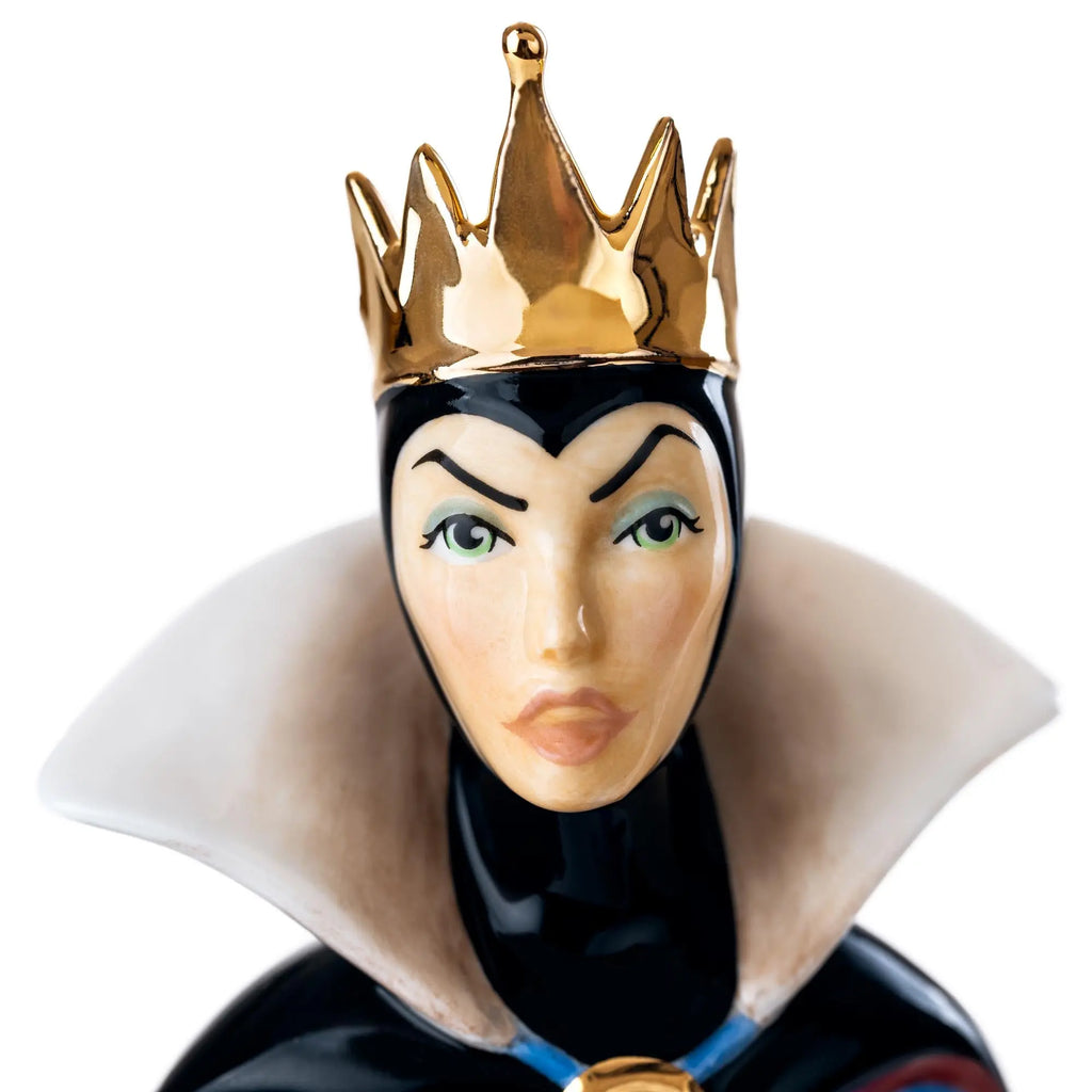 Fine bone china queen figurine with gold crown and black cloak, painted face