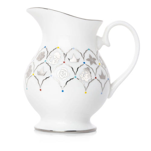 White porcelain cream jug with curved handle and spout, gray floral garland with dots
