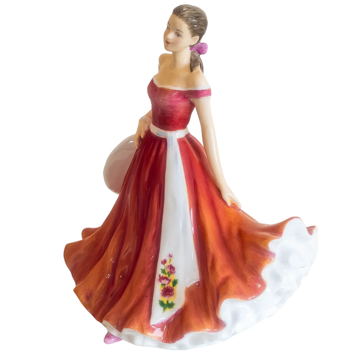 Bone china figurine woman shown in profile wearing red dress with orange skirt and white center panel