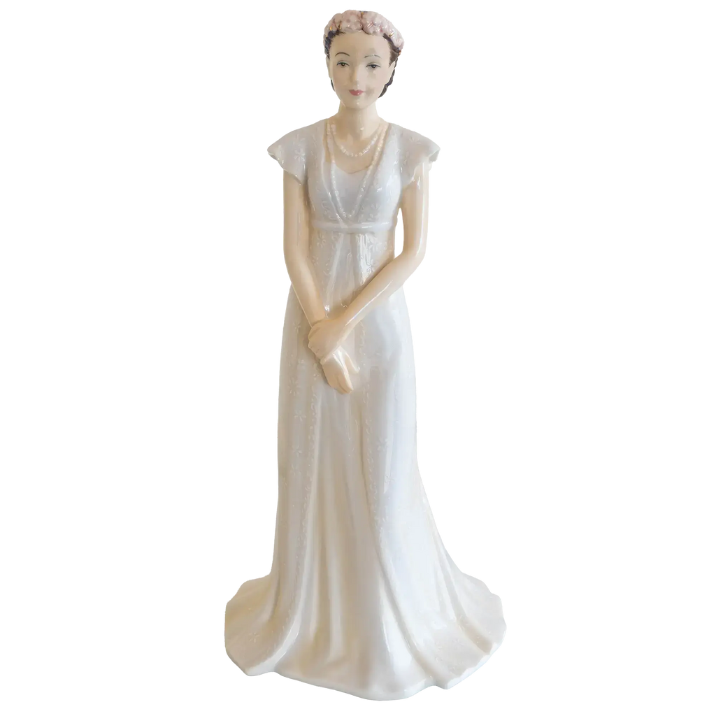 White fine bone china bride figurine with floral hairpiece and long flowing gown