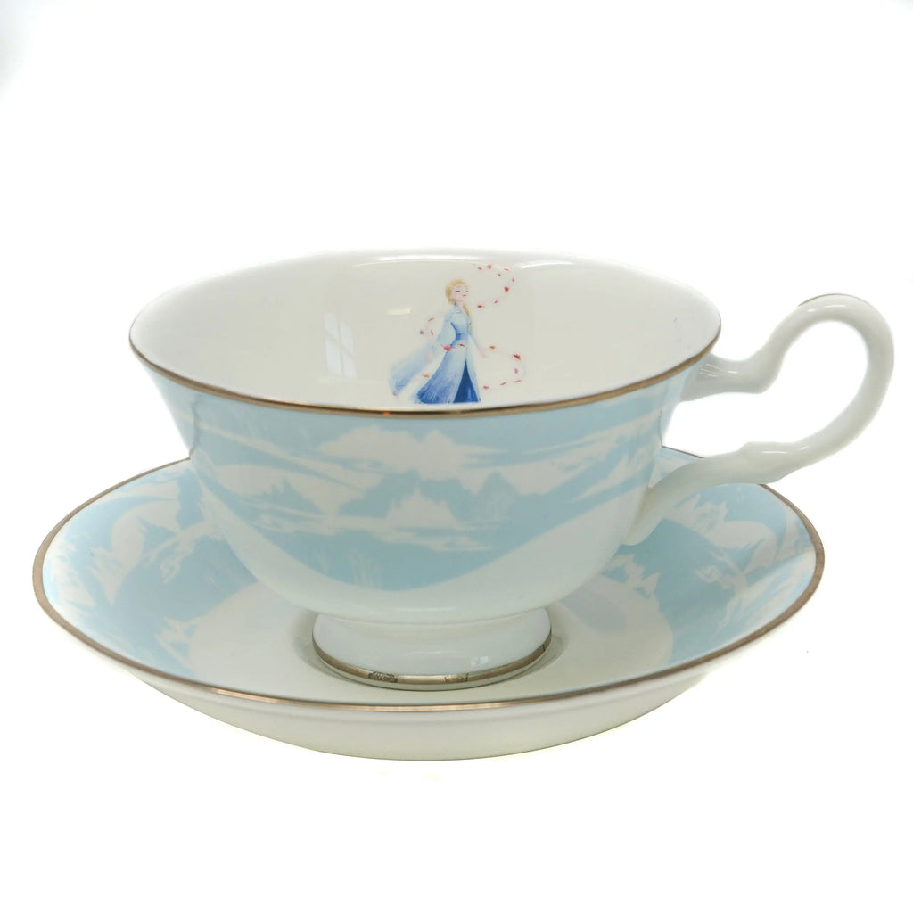 Fine bone china cup and saucer set, light blue with gold rim and Elsa-style art