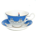 Blue fine bone china cup and saucer with gold rim and lady illustration