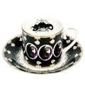 Fine bone china cup and saucer set with black, white, purple swirl design